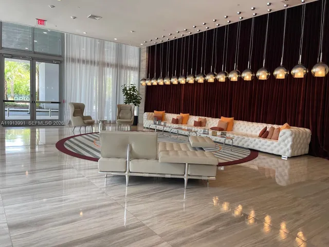 a living room with furniture and view of living room