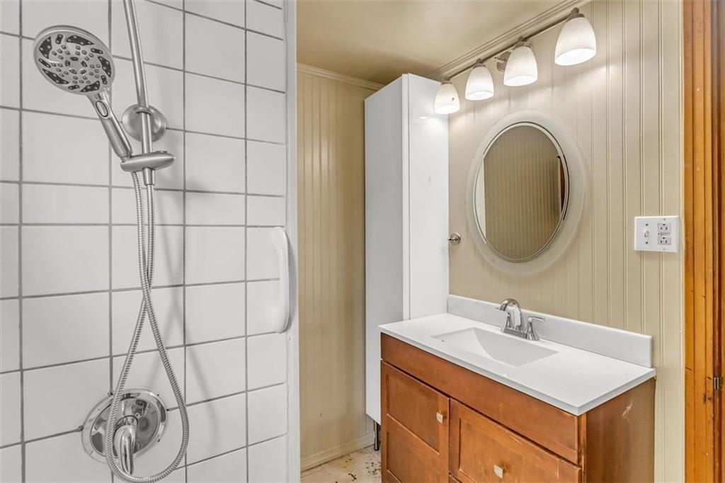 575 State Rte 908 Extension Tarentum, PA 15084 - Photo 15 of 32 a bathroom with a sink vanity and mirror