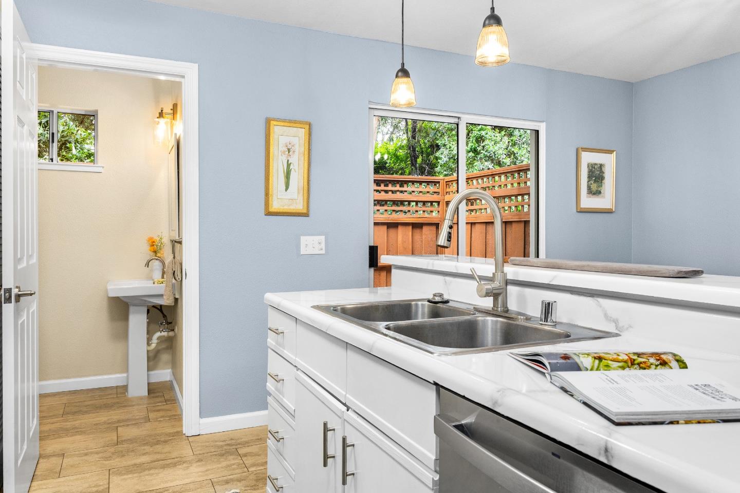 1644 Ocean Street Santa Cruz, CA 95060 - Photo 14 of 60 a kitchen with a sink and a window
