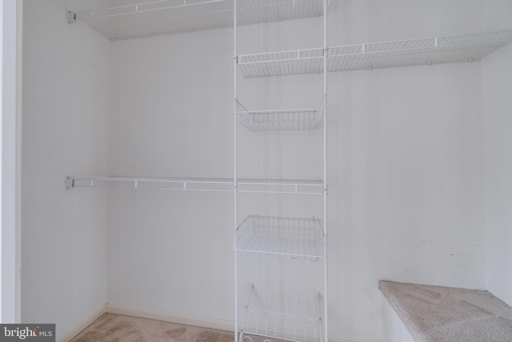 7902 Birchtree Court Springfield, VA 22152 - Photo 18 of 37 Master Walk In Closet with Shelving