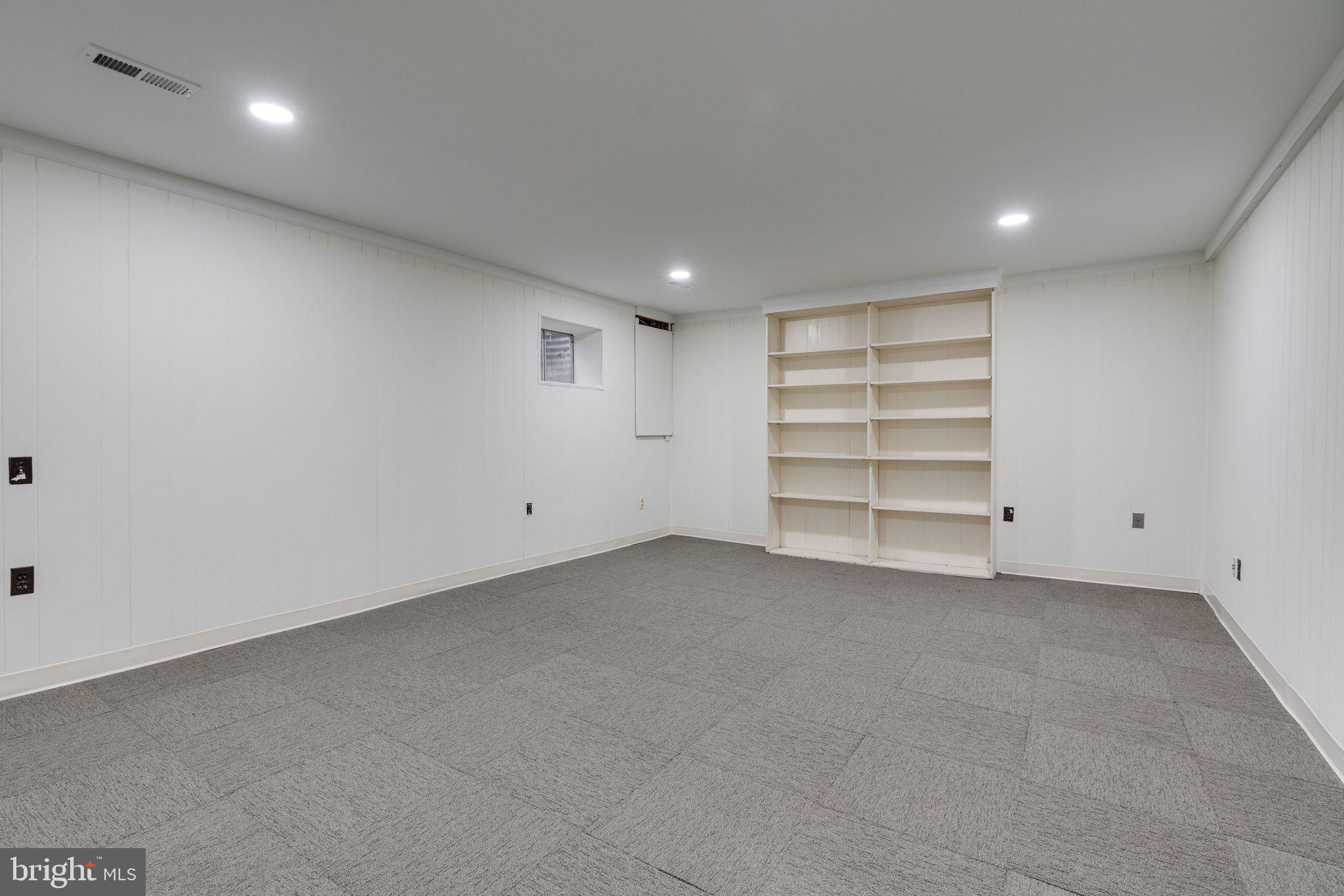 7902 Birchtree Court Springfield, VA 22152 - Photo 26 of 37 Recreation Room with Built In Shelving