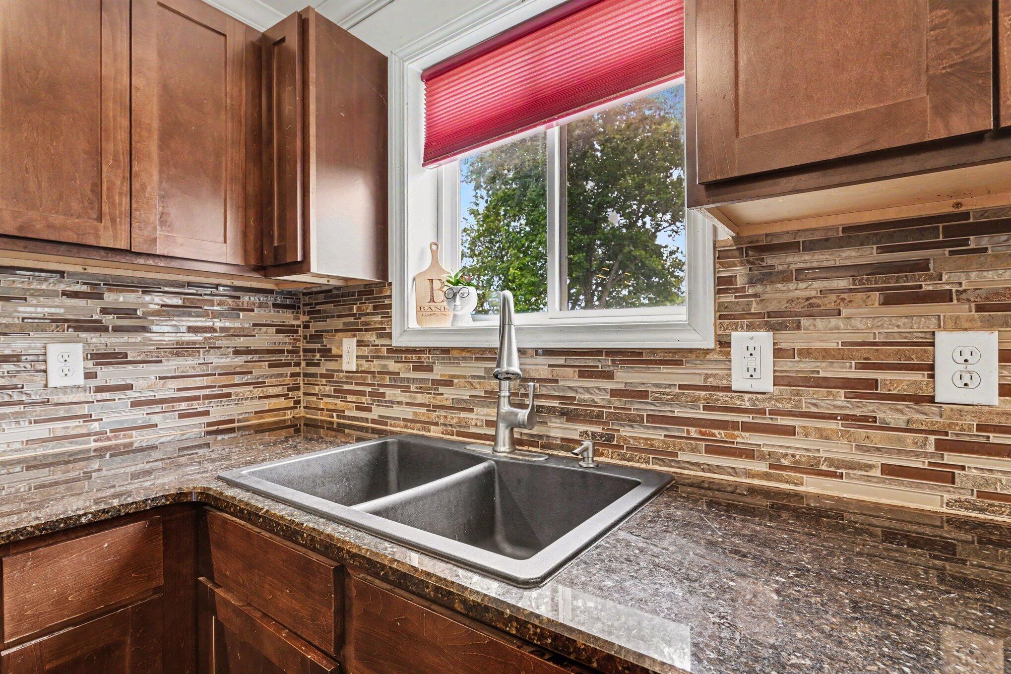 6129 Old State Road North Branch, MI 48461 - Photo 9 of 29 010-Kitchen sink and back splash
