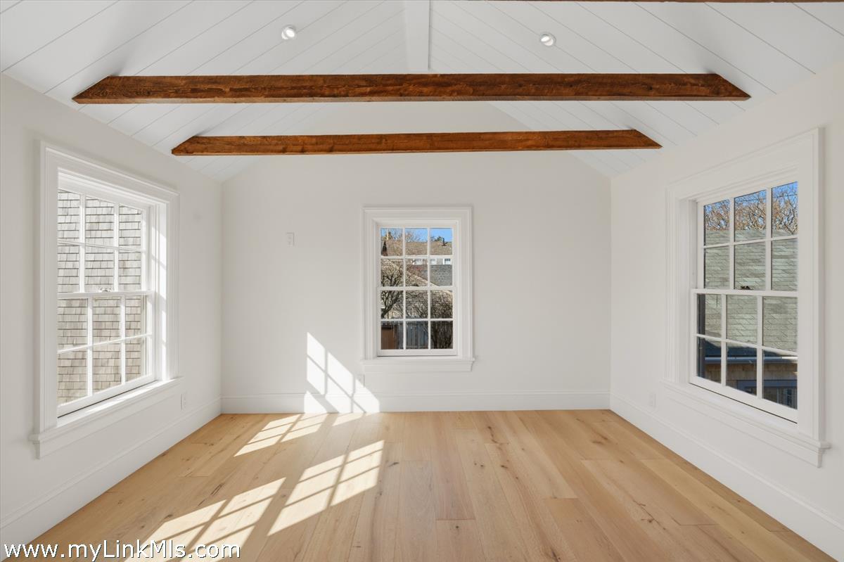 85 Orange Street Nantucket, MA 02554 - Photo 71 of 89 a view of a room with wooden floor and windows