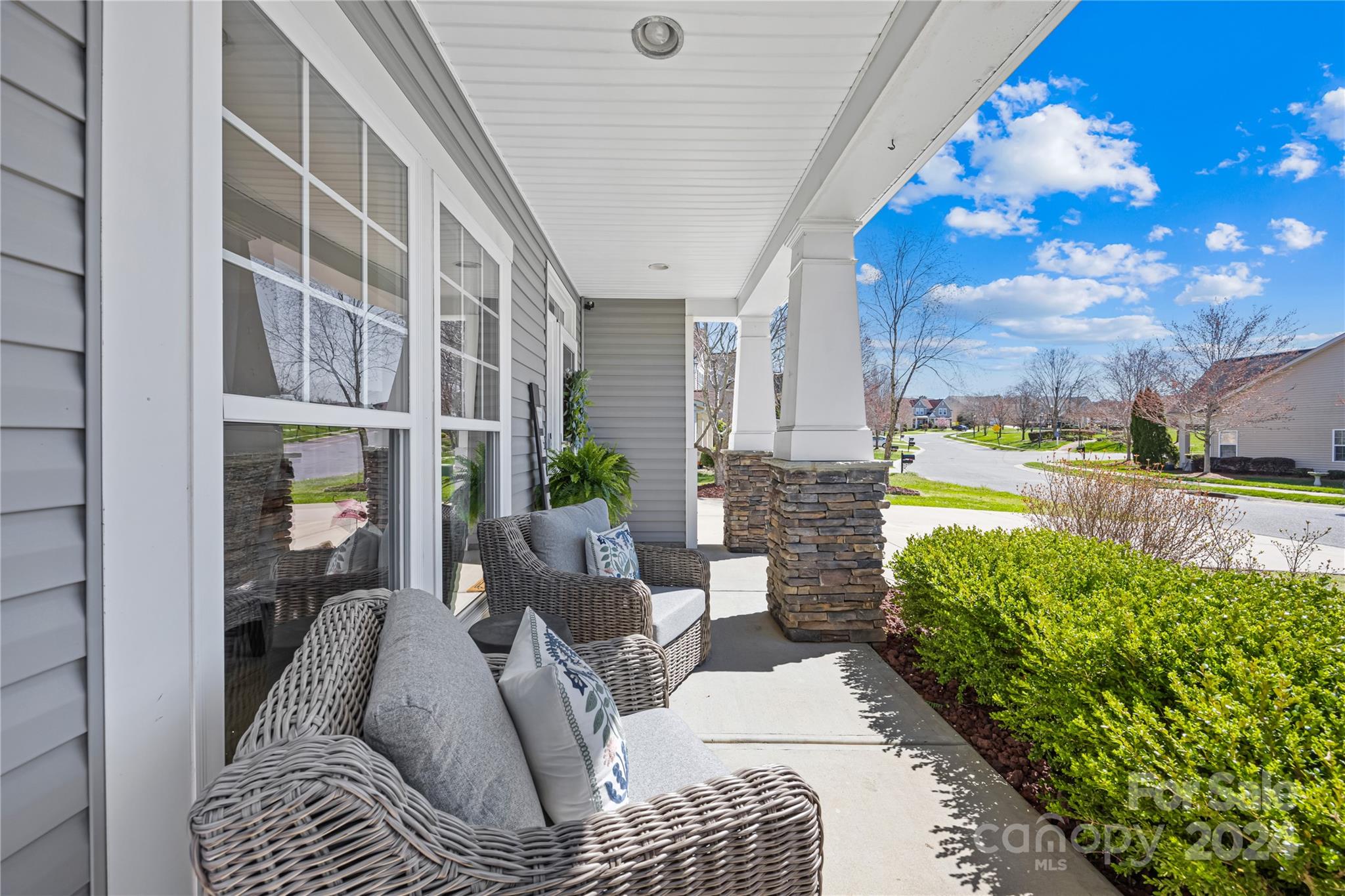 1003 Sipes Place Indian Trail, NC 28079 - Photo 11 of 45 a view of balcony with couch and potted plants