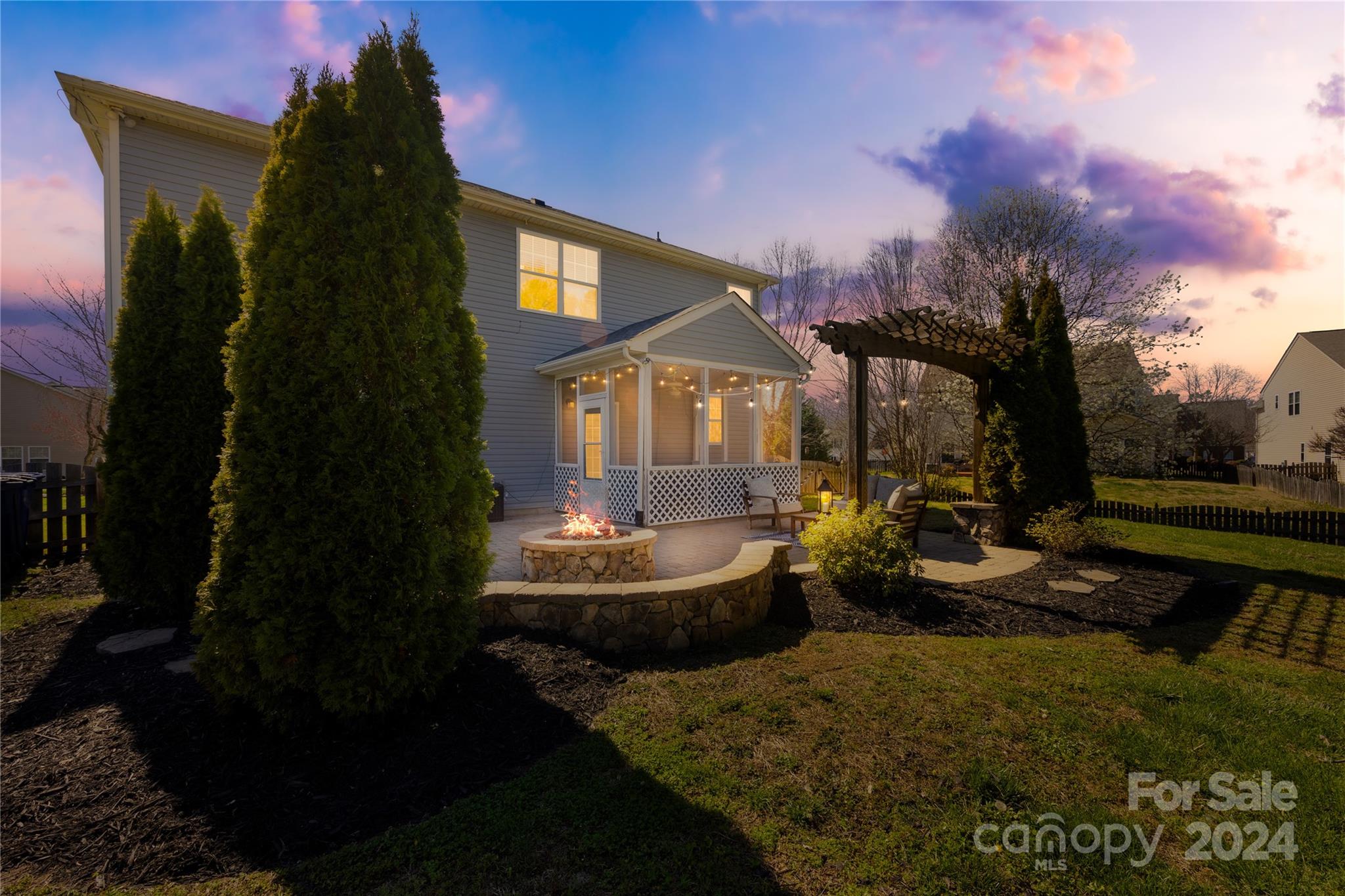 1003 Sipes Place Indian Trail, NC 28079 - Photo 2 of 45 a front view of house with yard outdoor seating and green space