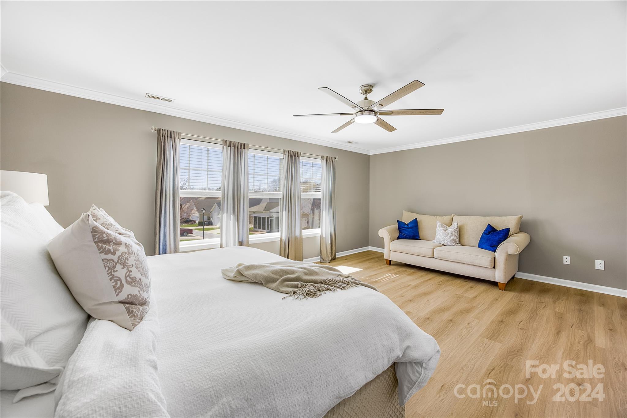 1003 Sipes Place Indian Trail, NC 28079 - Photo 26 of 45 a bedroom with a bed couch and window