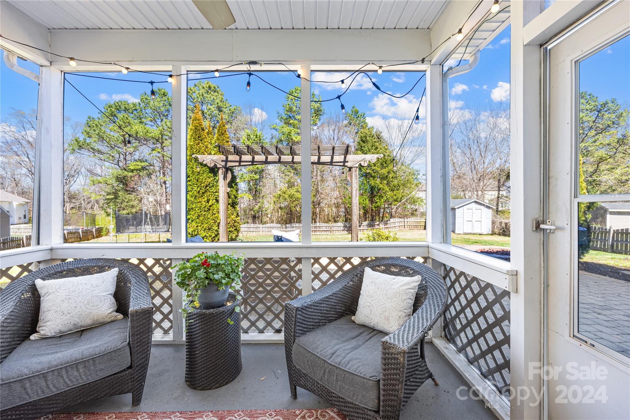1003 Sipes Place Indian Trail, NC 28079 - Photo 38 of 45 a balcony with furniture and a potted plant