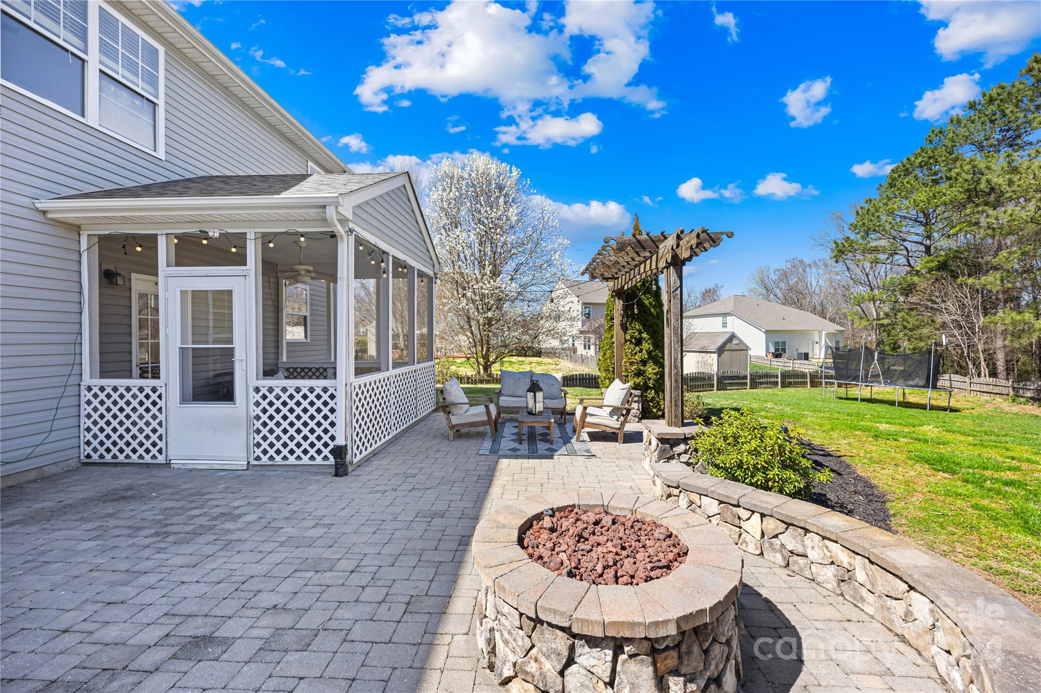 1003 Sipes Place Indian Trail, NC 28079 - Photo 39 of 45 a view of a patio with a table chairs and backyard