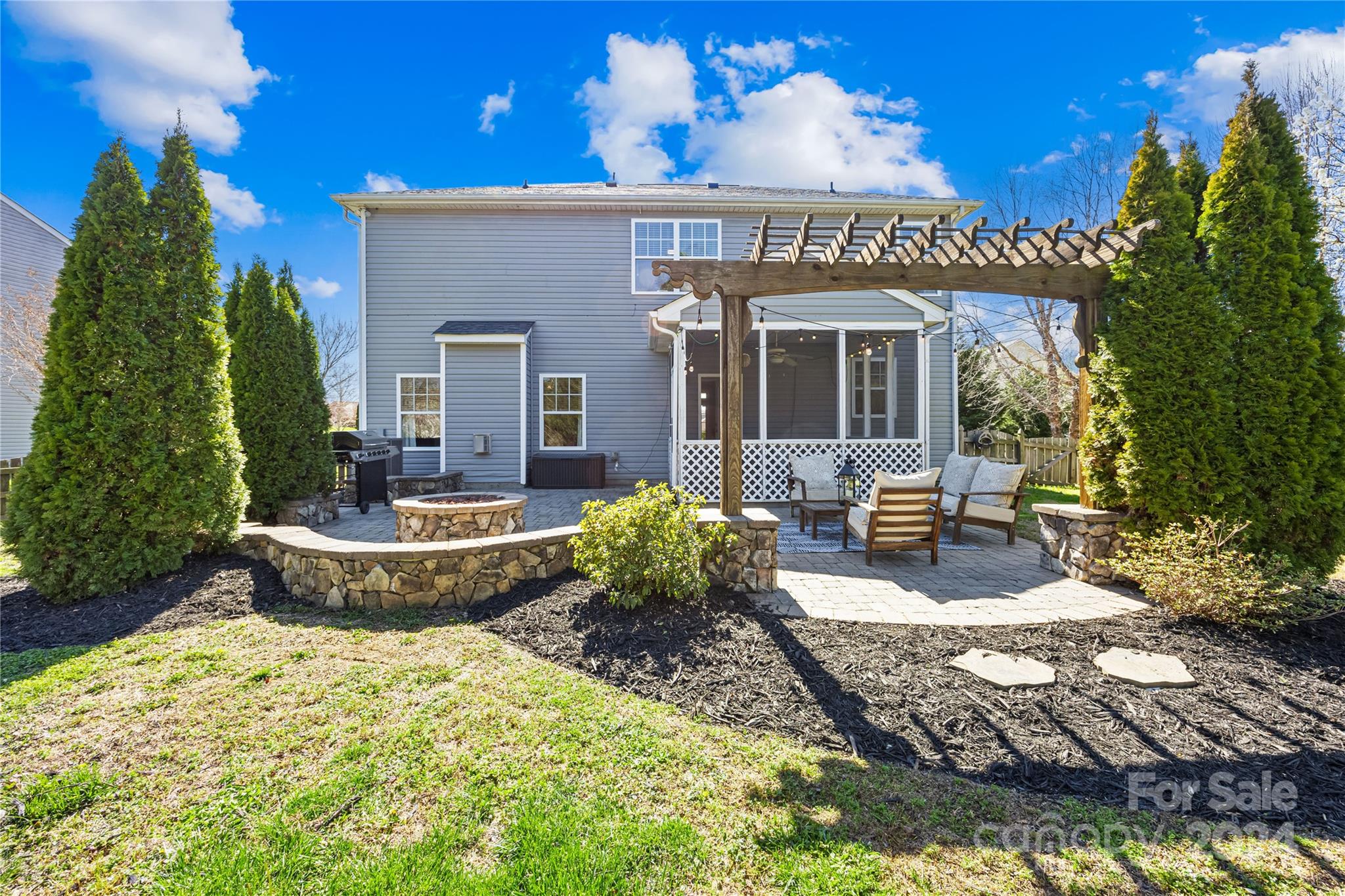 1003 Sipes Place Indian Trail, NC 28079 - Photo 42 of 45 a view of a house with fountain bath tub and chairs