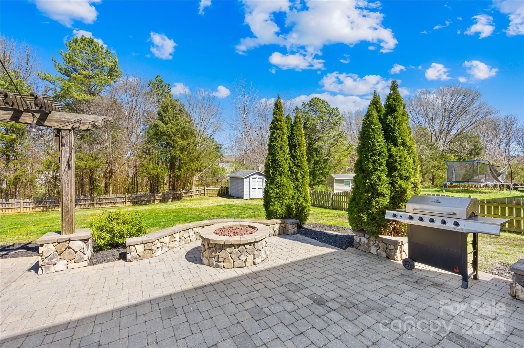 1003 Sipes Place Indian Trail, NC 28079 - Photo 44 of 45 a view of a two chairs and table in the garden