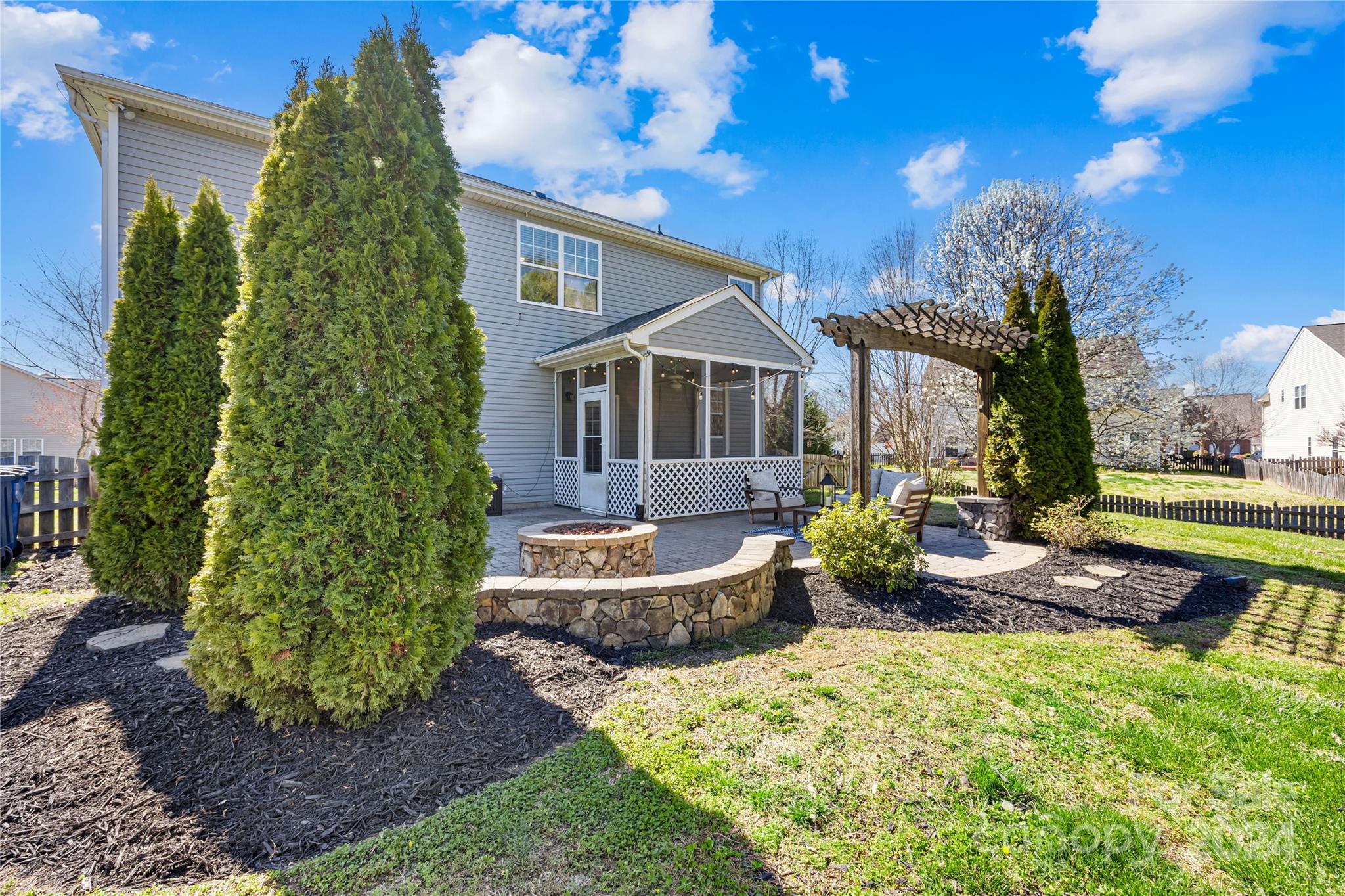 1003 Sipes Place Indian Trail, NC 28079 - Photo 9 of 45 a front view of a house with garden