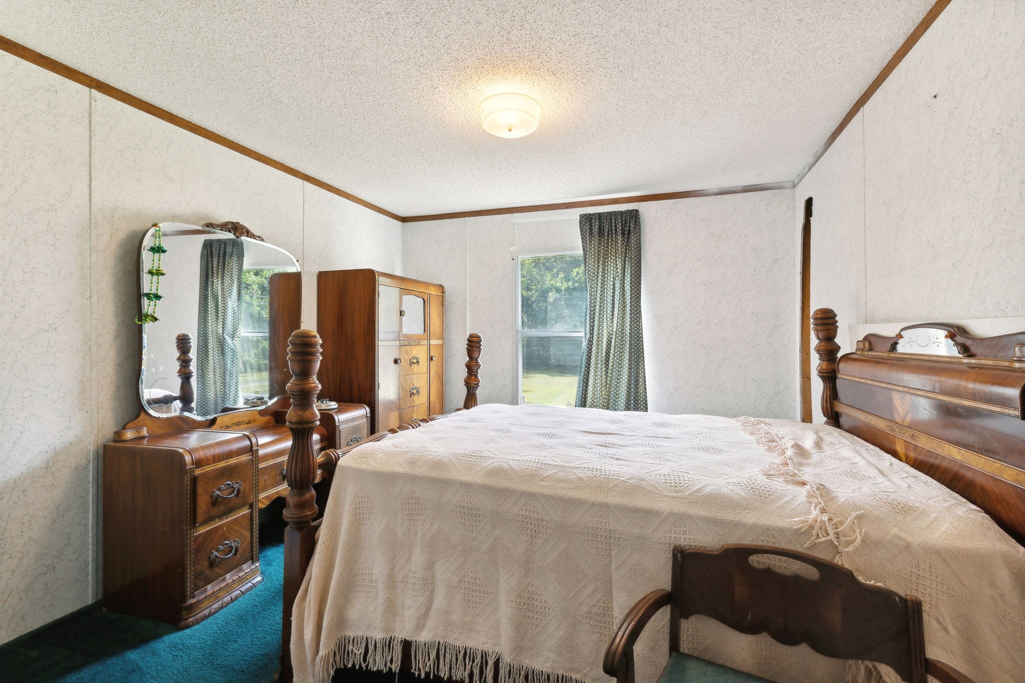 3270 Rocky Valley Road Lebanon, TN 37090 - Photo 38 of 55 a bedroom with a bed and wooden floor