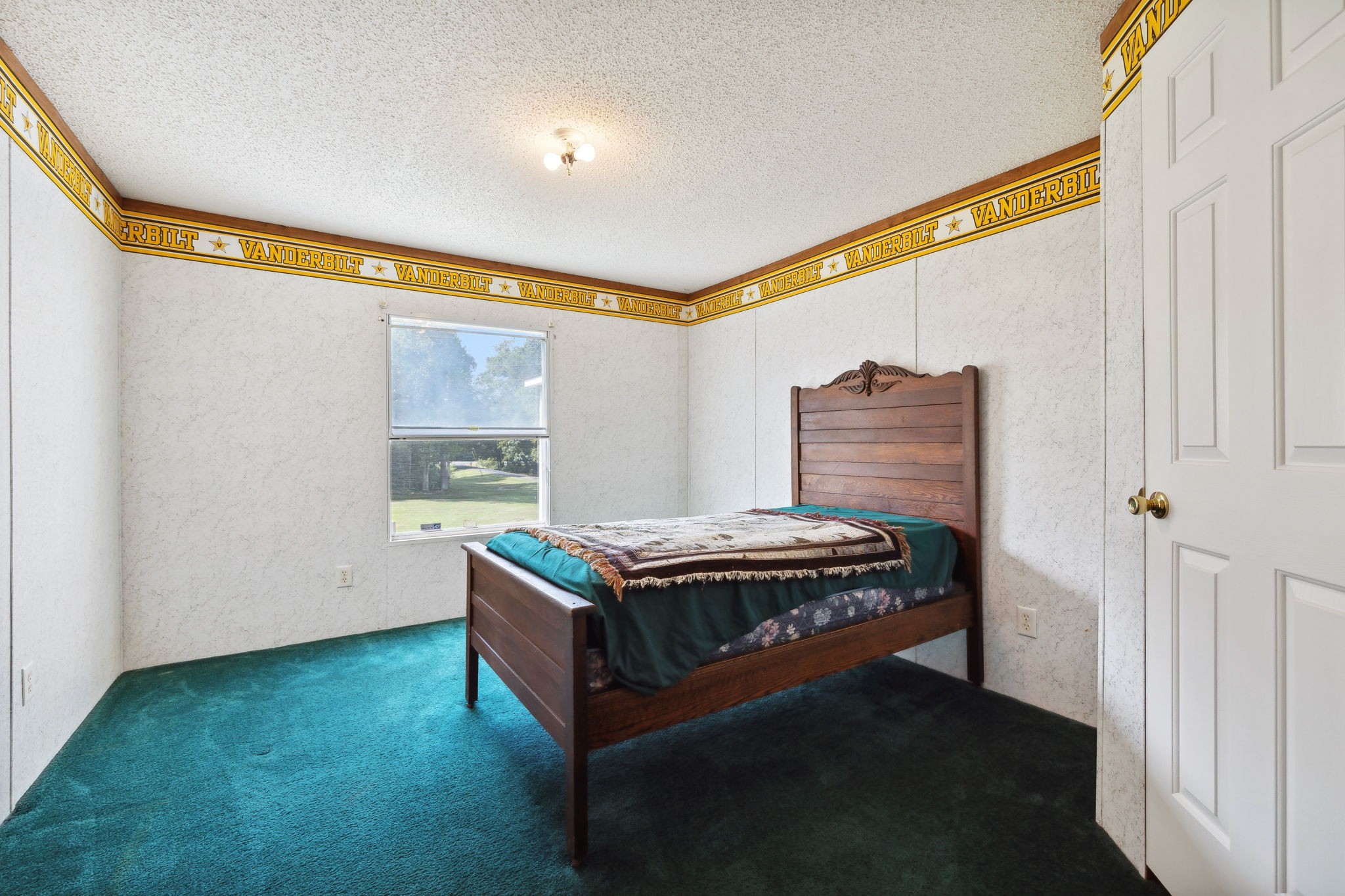 3270 Rocky Valley Road Lebanon, TN 37090 - Photo 41 of 55 a room with a bed and a window