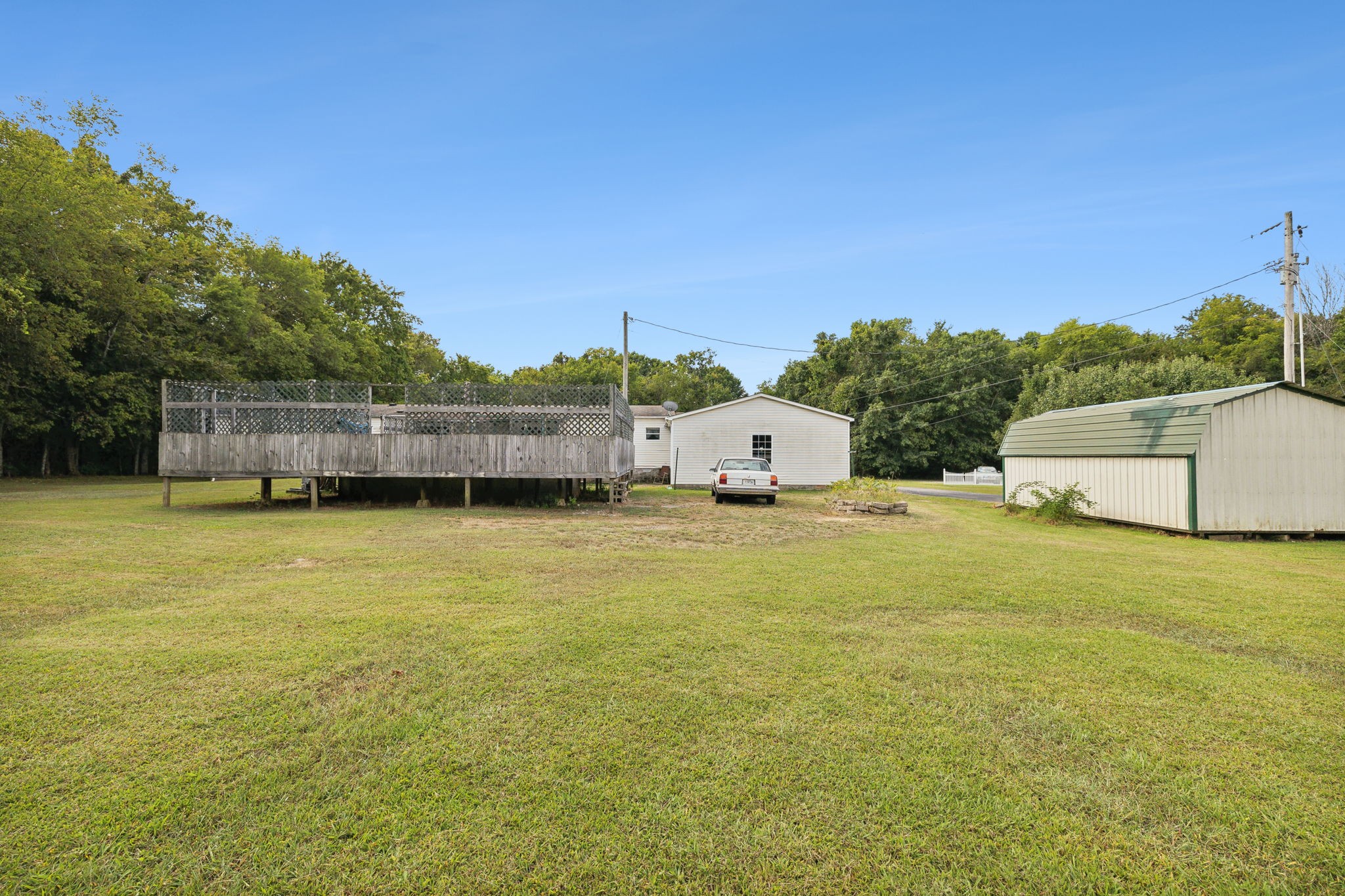 3270 Rocky Valley Road Lebanon, TN 37090 - Photo 44 of 55 a view of a swimming pool with a yard