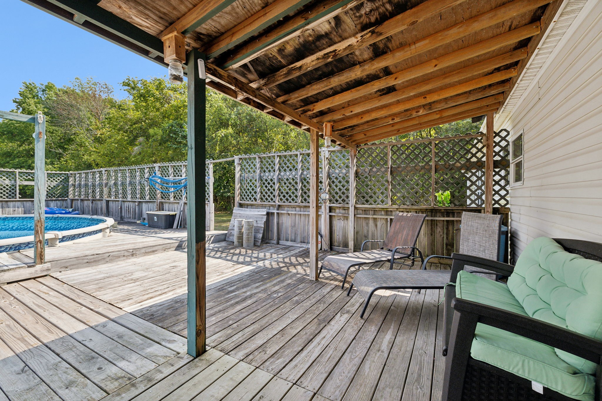 3270 Rocky Valley Road Lebanon, TN 37090 - Photo 45 of 55 a view of a chairs and table on the deck