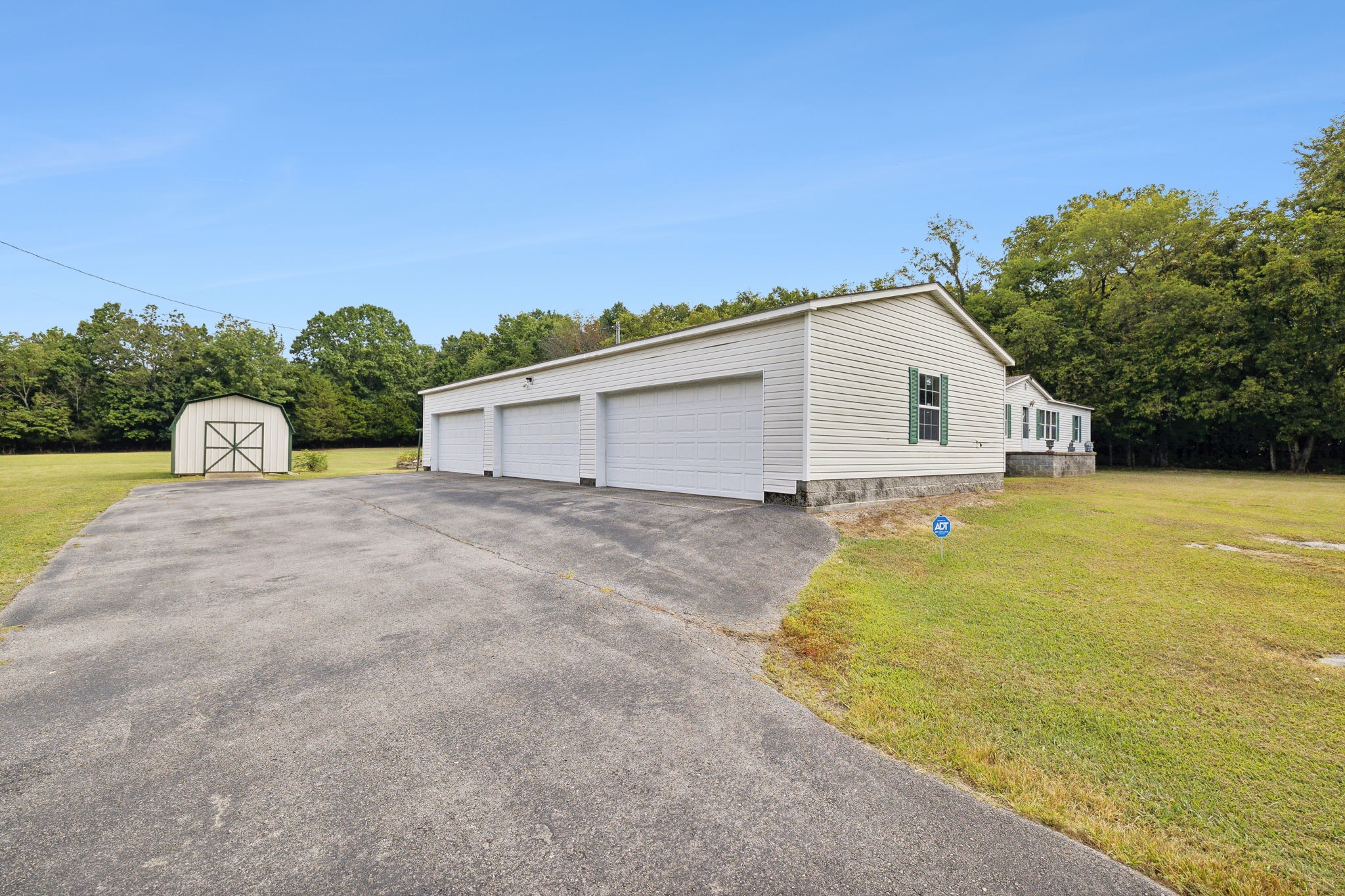 3270 Rocky Valley Road Lebanon, TN 37090 - Photo 5 of 55 a view of a house with a backyard