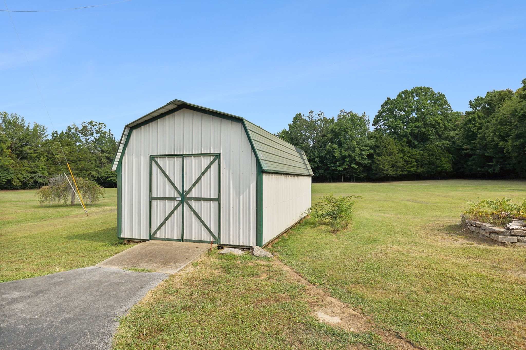 3270 Rocky Valley Road Lebanon, TN 37090 - Photo 6 of 55 a view of a house with a yard