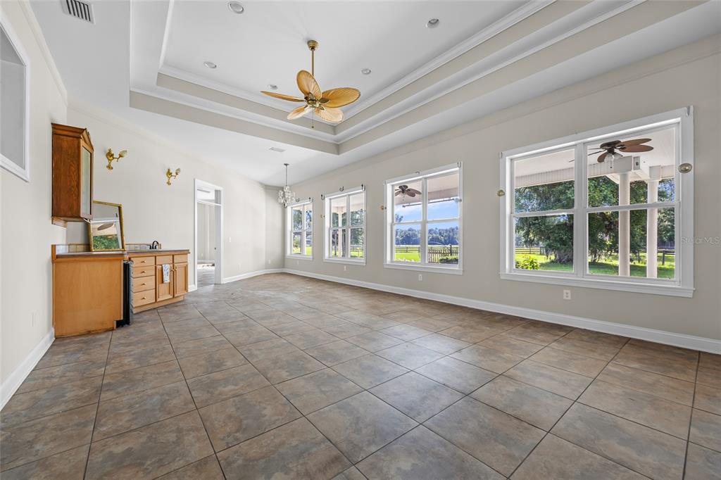 10852 89th Road Live Oak, FL 32060 - Photo 18 of 40 a view of an empty room with window and cabinet