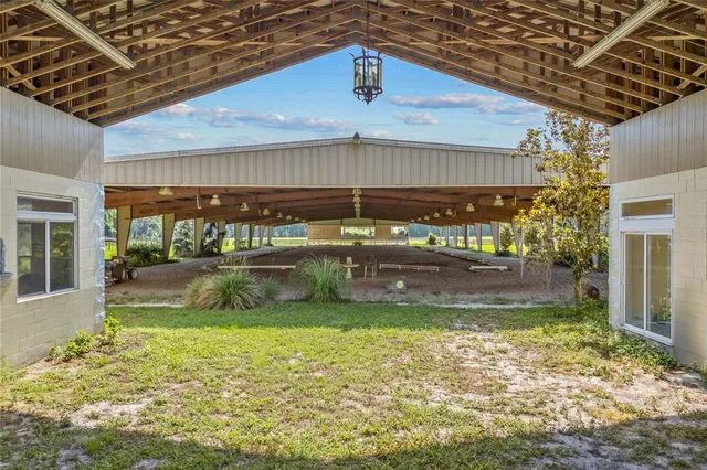 a view of a back yard of the house