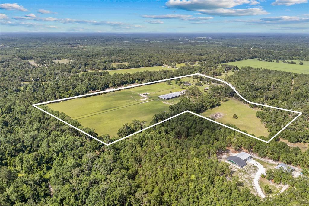 10852 89th Road Live Oak, FL 32060 - Photo 36 of 40 a view of a balcony with a yard