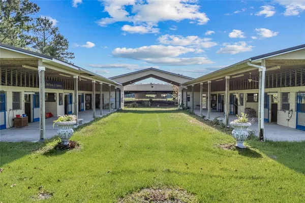 a view of a house with a street