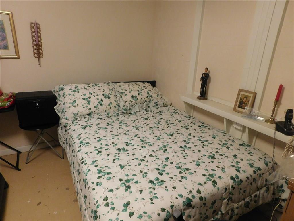 6716 Verona Road Penn Hills, PA 15147 - Photo 15 of 21 Lower level den area with an extra sleeping area.