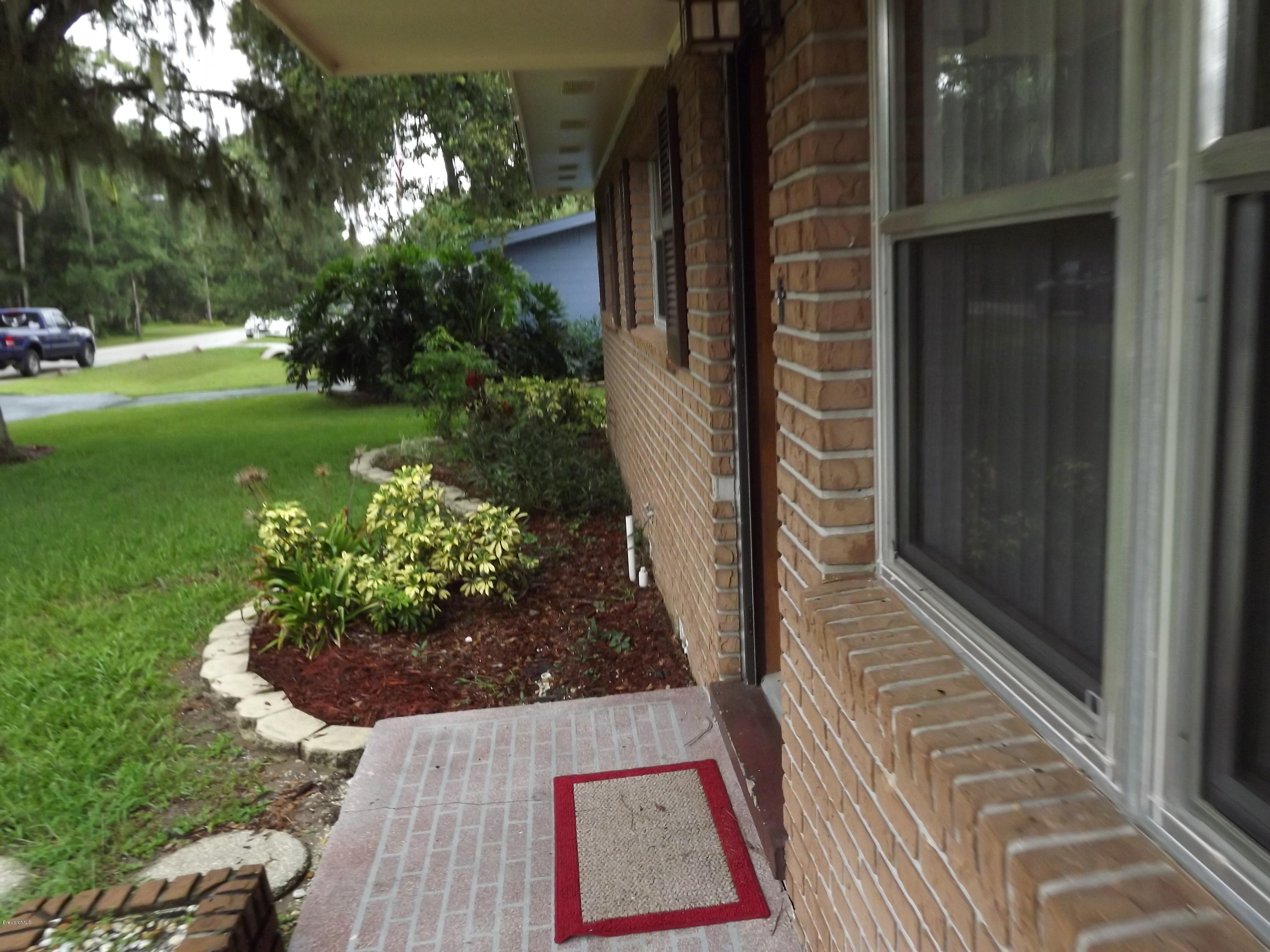 1034 Hayden Road Rockledge, FL 32955 - Photo 14 of 22 Covered Front Door