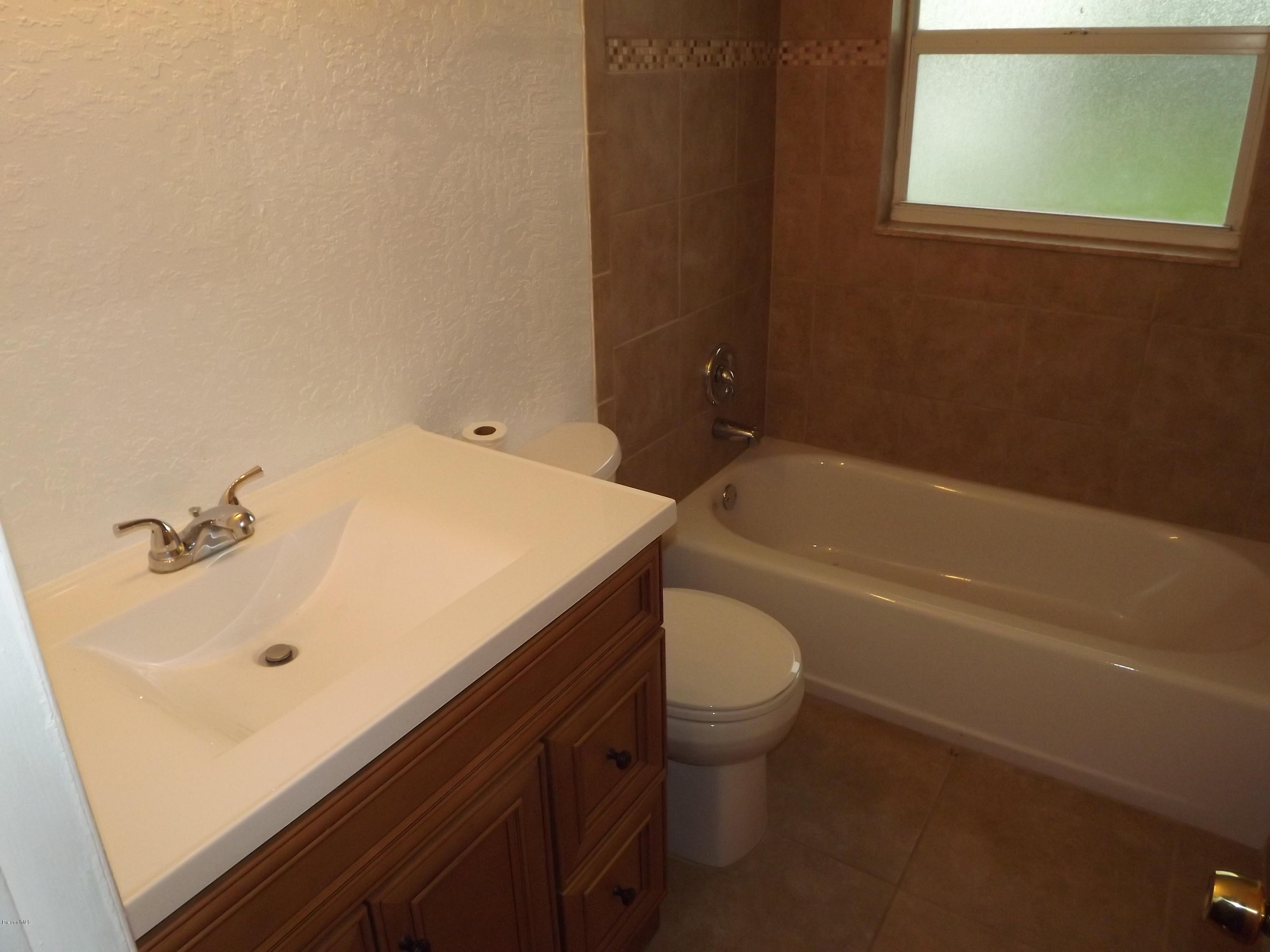 1034 Hayden Road Rockledge, FL 32955 - Photo 3 of 22 Guest Bathroom