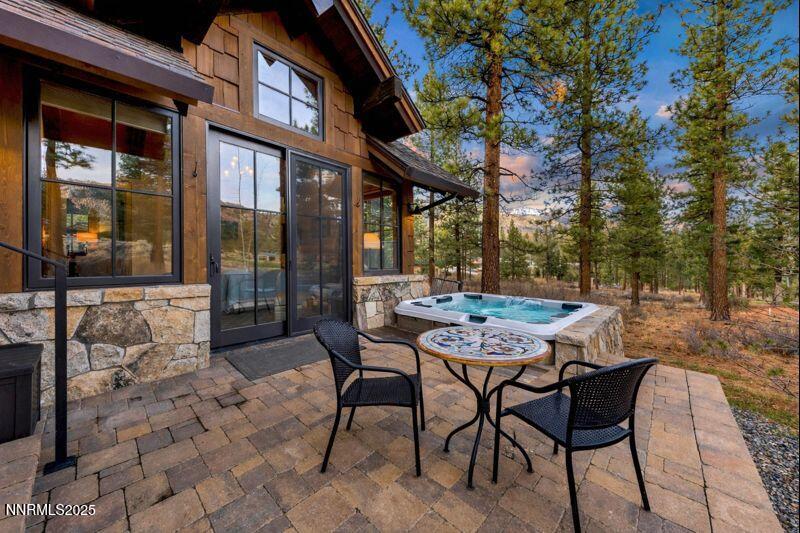 261 Redding Way Carson City, NV 89705 - Photo 63 of 90 a backyard of a house with table and chairs