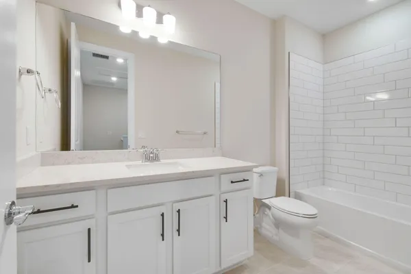 a view of storage and utility room with washer and dryer