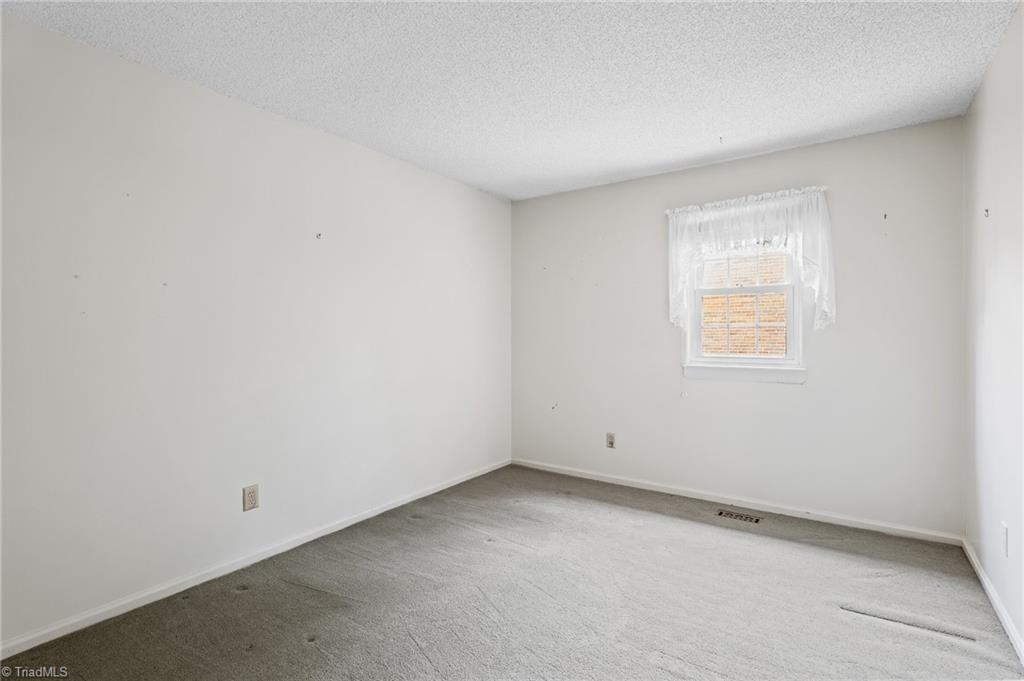 5747 Bramblegate Road, Unit A Greensboro, NC 27409 - Photo 13 of 19 2nd bedroom