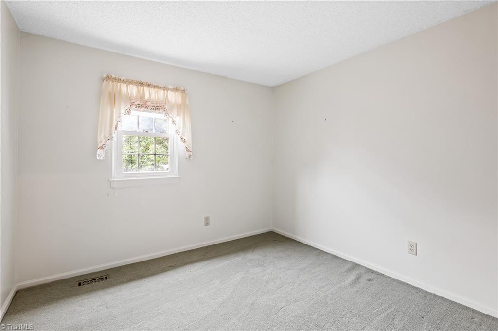 5747 Bramblegate Road, Unit A Greensboro, NC 27409 - Photo 14 of 19 3rd bedroom