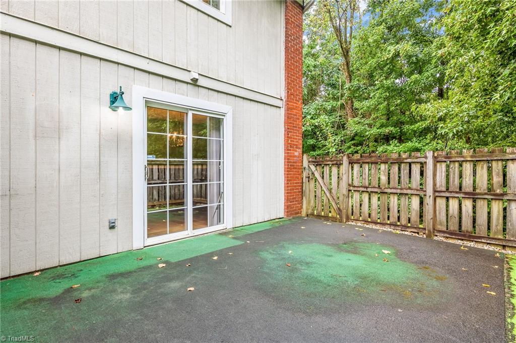 5747 Bramblegate Road, Unit A Greensboro, NC 27409 - Photo 16 of 19 Back patio