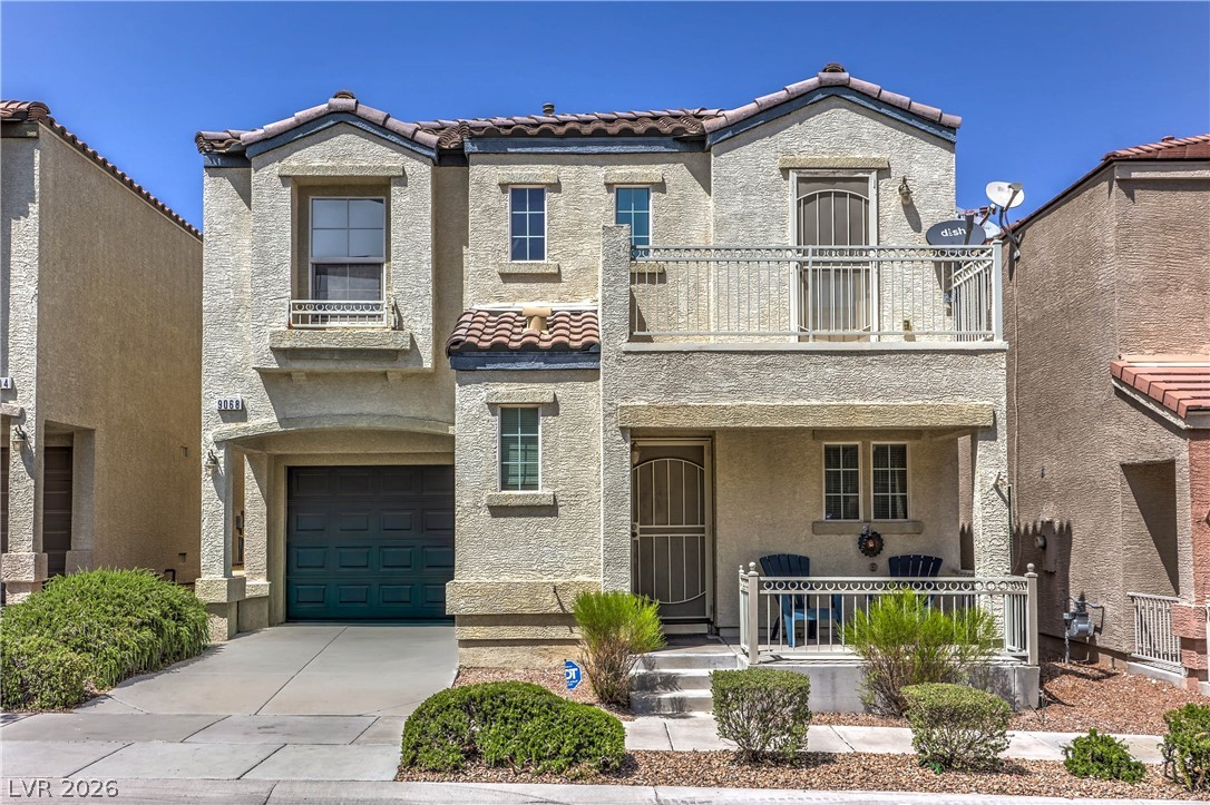 9068 West Alluring Avenue Las Vegas, NV 89149 - Photo 1 of 23 This appealing dwelling showcases an inviting facade with a charming front porch.