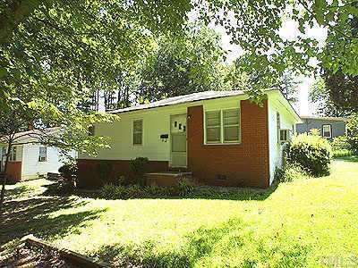 711 Oak Road Raleigh, NC 27603 - Photo 1 of 1 a front view of a house with a yard
