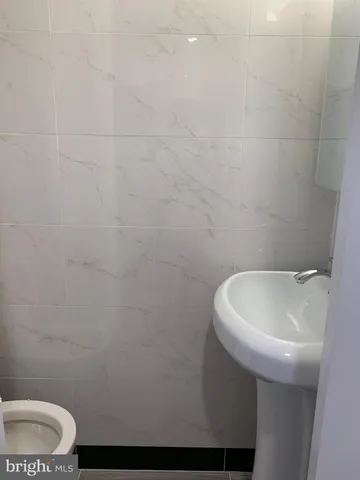 a bathroom with a sink and a toilet