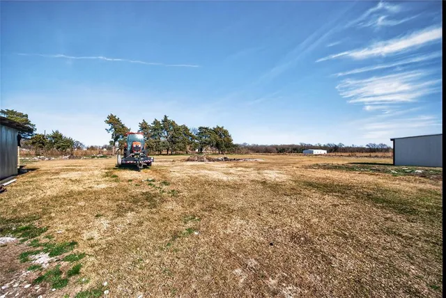 a view of a lake with outdoor space