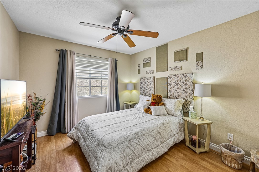 5236 Saranac Road Las Vegas, NV 89130 - Photo 32 of 52 Ceiling fan in guest bedroom