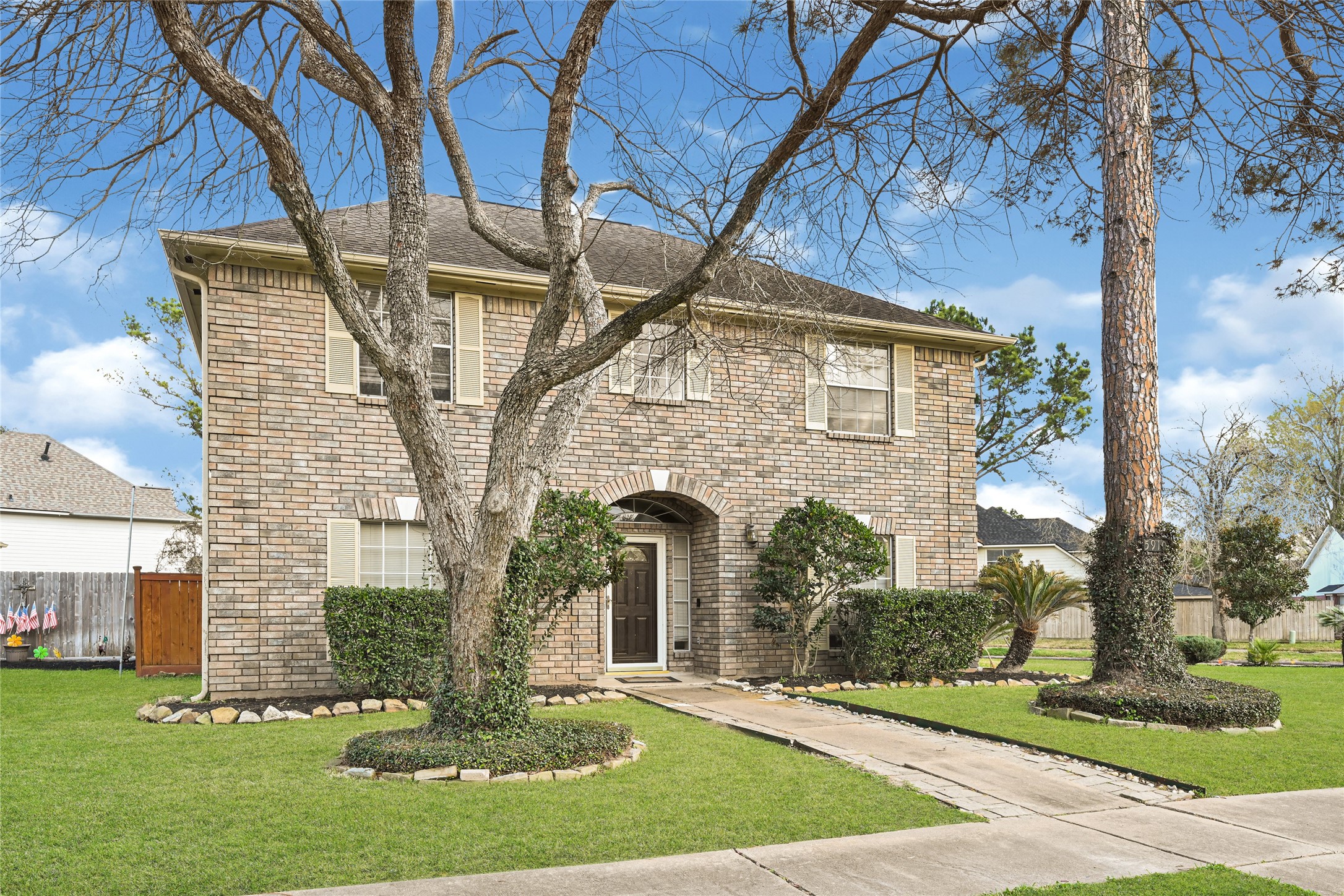 5910 Rolff Lane Houston, TX 77084 - Photo 2 of 50 Front exterior showcasing timeless architecture, balanced design, and a welcoming presence.