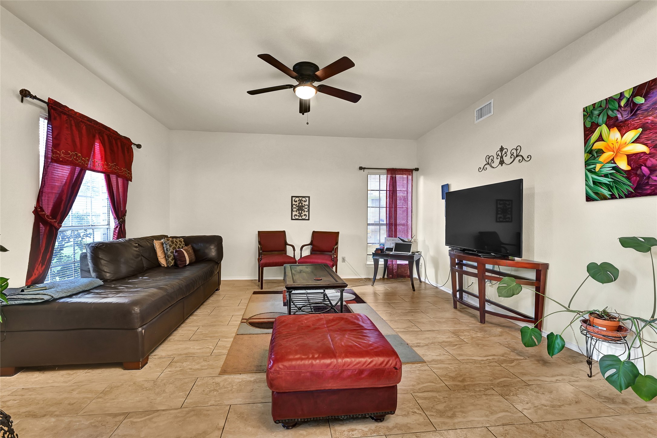 5910 Rolff Lane Houston, TX 77084 - Photo 35 of 50 Comfortable living room with natural light and multiple furniture layout options.