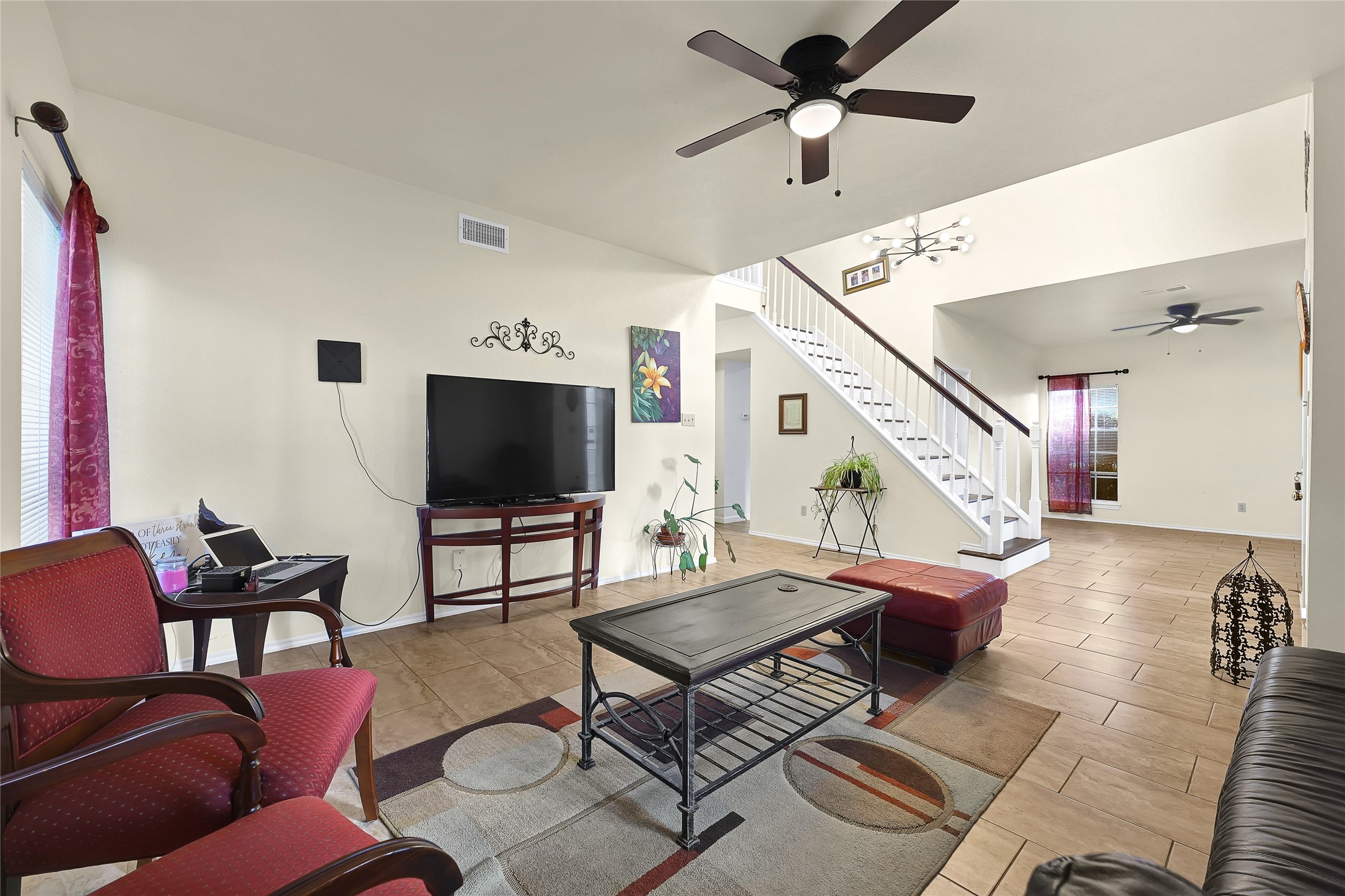 5910 Rolff Lane Houston, TX 77084 - Photo 37 of 50 Open-concept living area with room for multiple seating arrangements.