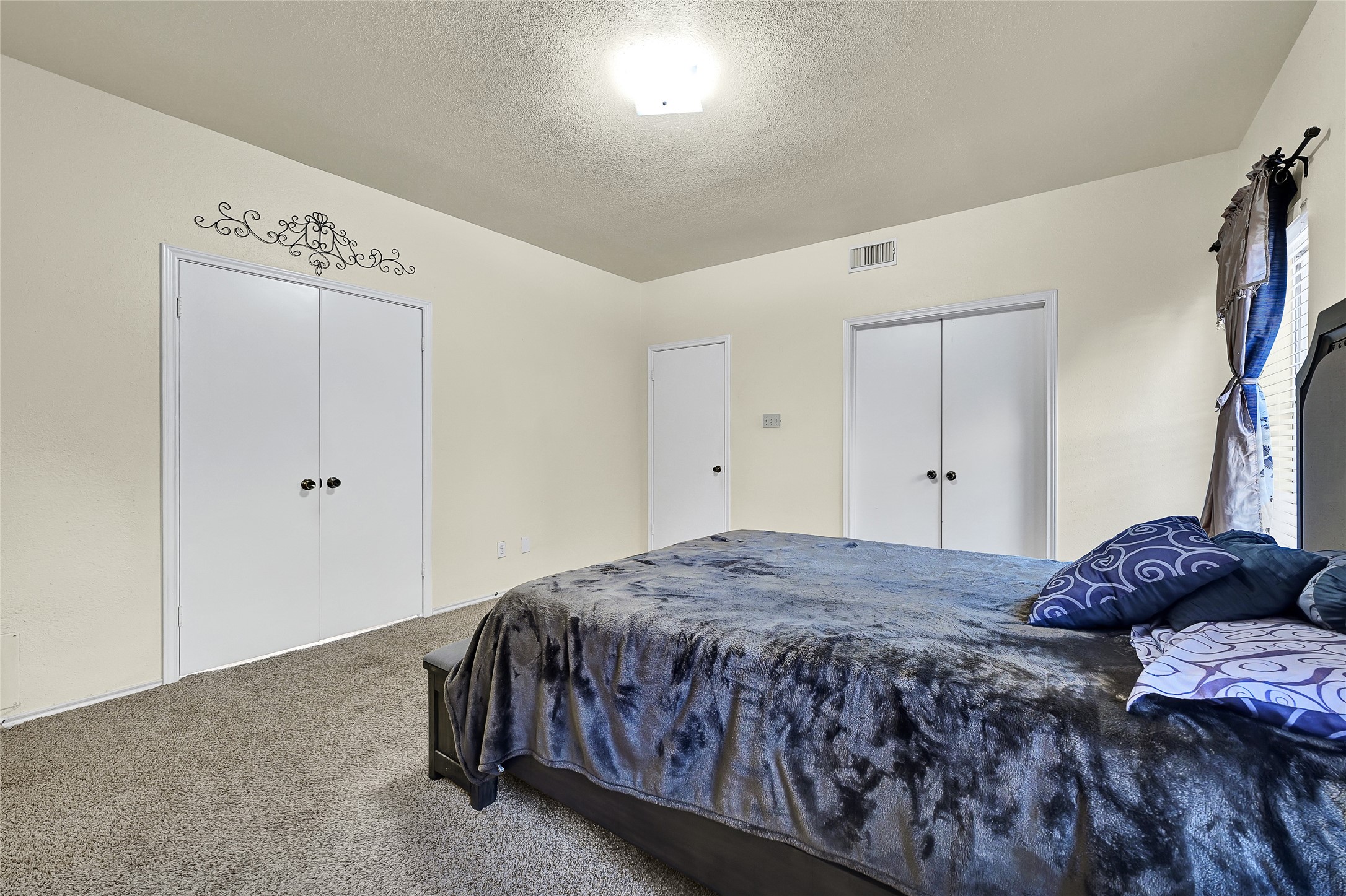 5910 Rolff Lane Houston, TX 77084 - Photo 40 of 50 Primary suite offering flexibility for furniture placement and comfortable living.