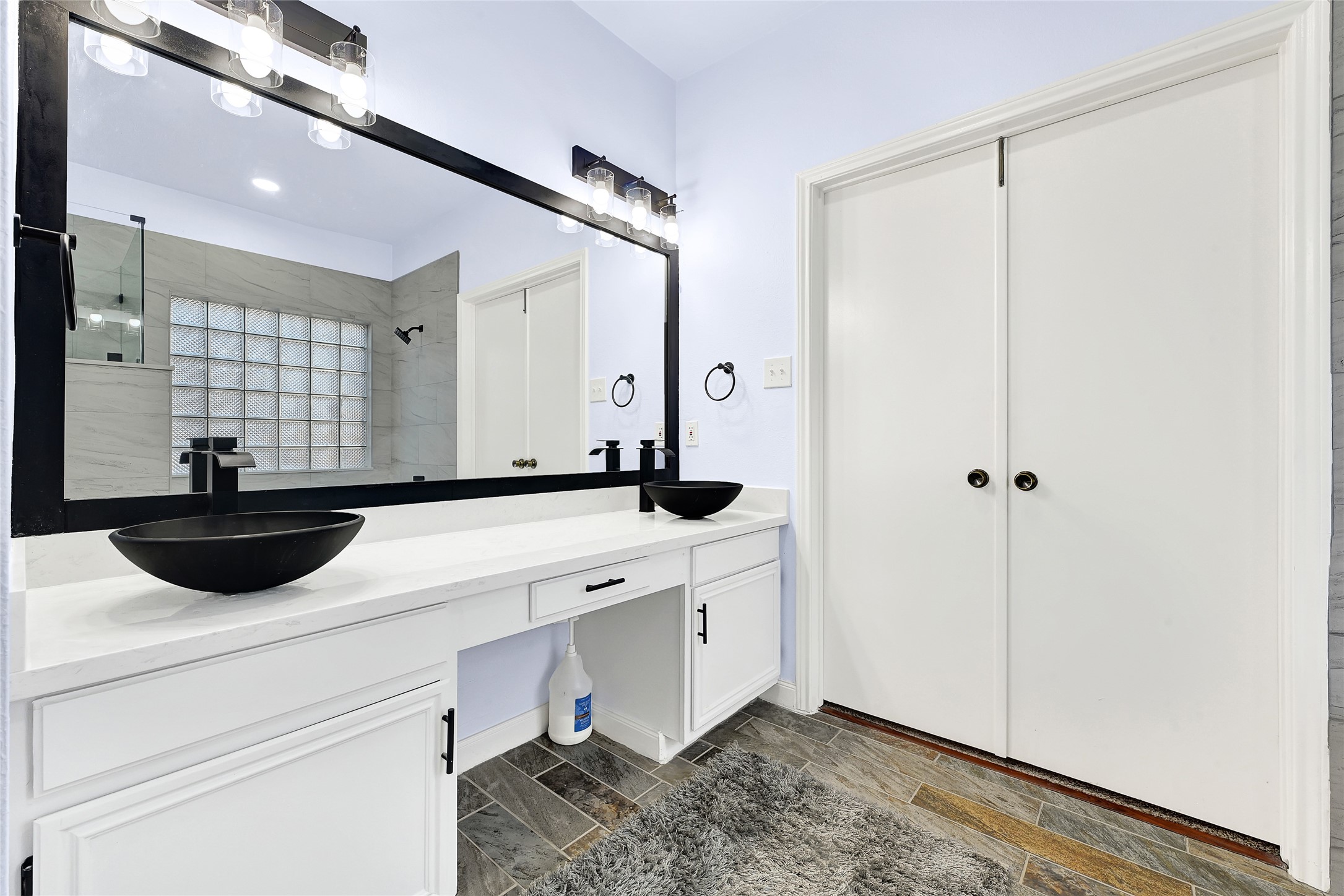 5910 Rolff Lane Houston, TX 77084 - Photo 43 of 50 Vanity area with updated lighting and functional design.