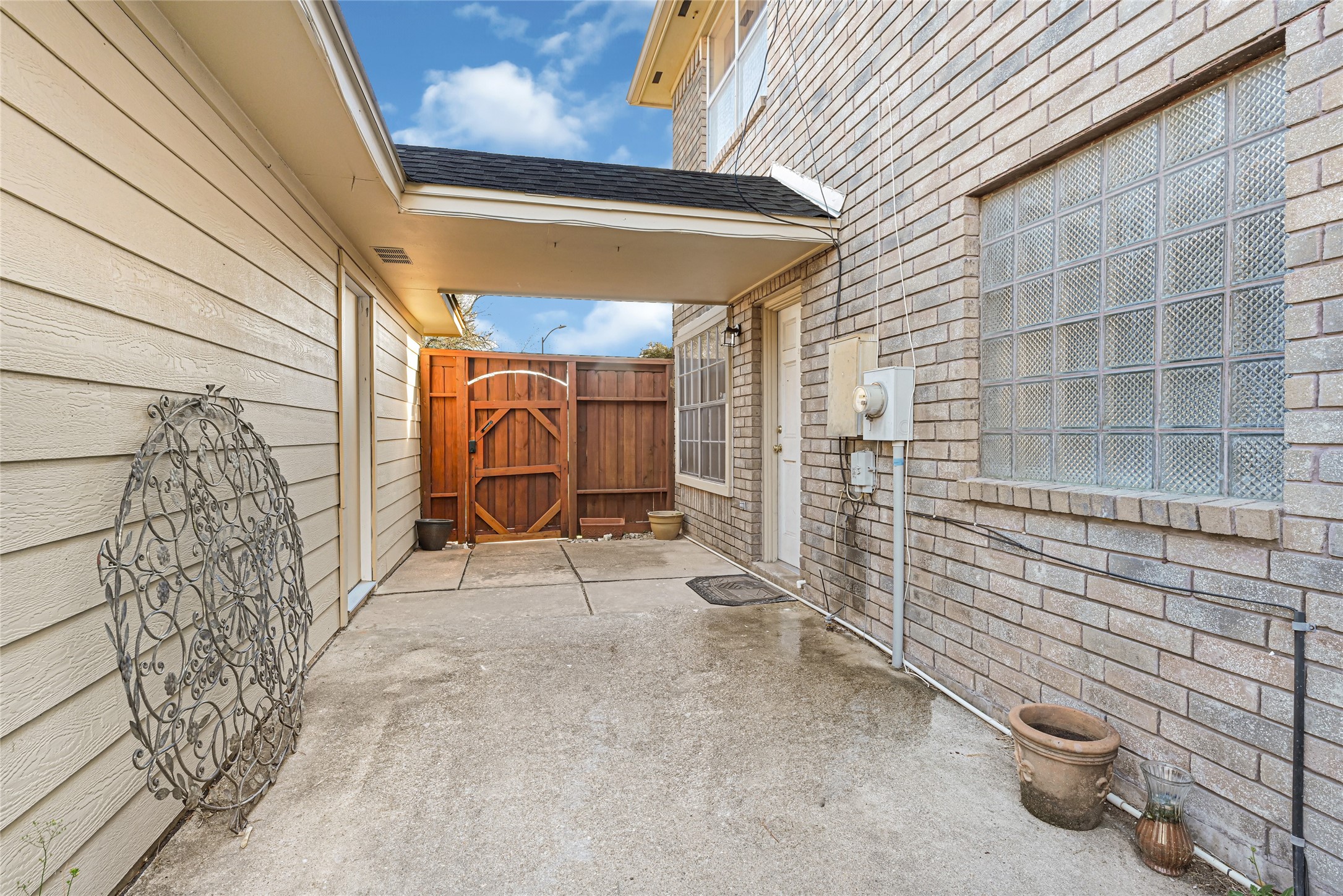 5910 Rolff Lane Houston, TX 77084 - Photo 44 of 50 Covered patio ideal for outdoor dining, relaxing, or entertaining guests.