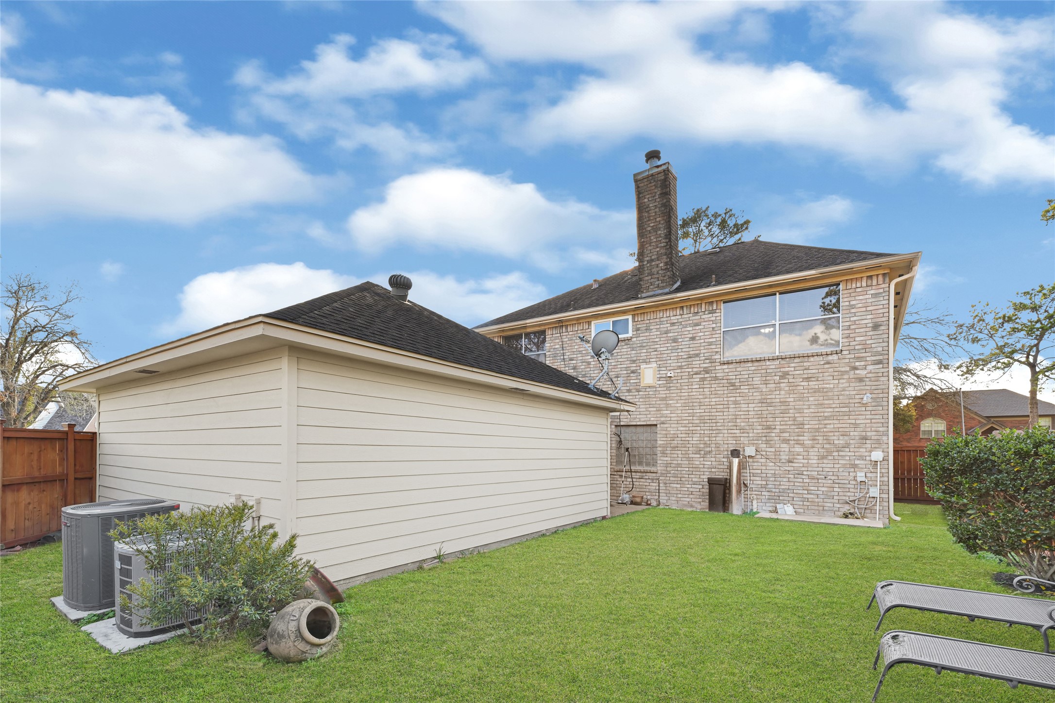 5910 Rolff Lane Houston, TX 77084 - Photo 48 of 50 Additional yard view highlighting size, privacy, and potential.