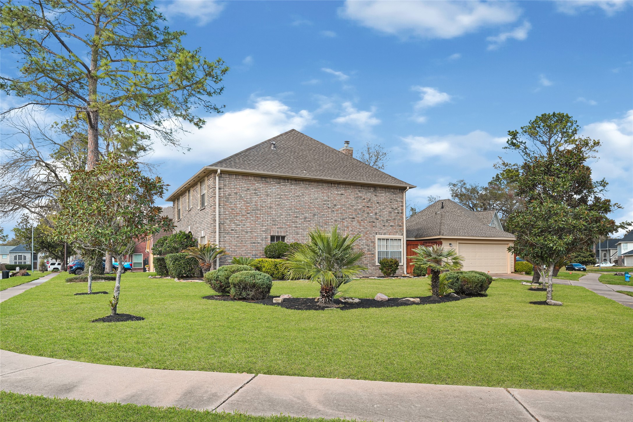5910 Rolff Lane Houston, TX 77084 - Photo 5 of 50 Side yard view highlighting additional outdoor space and privacy.