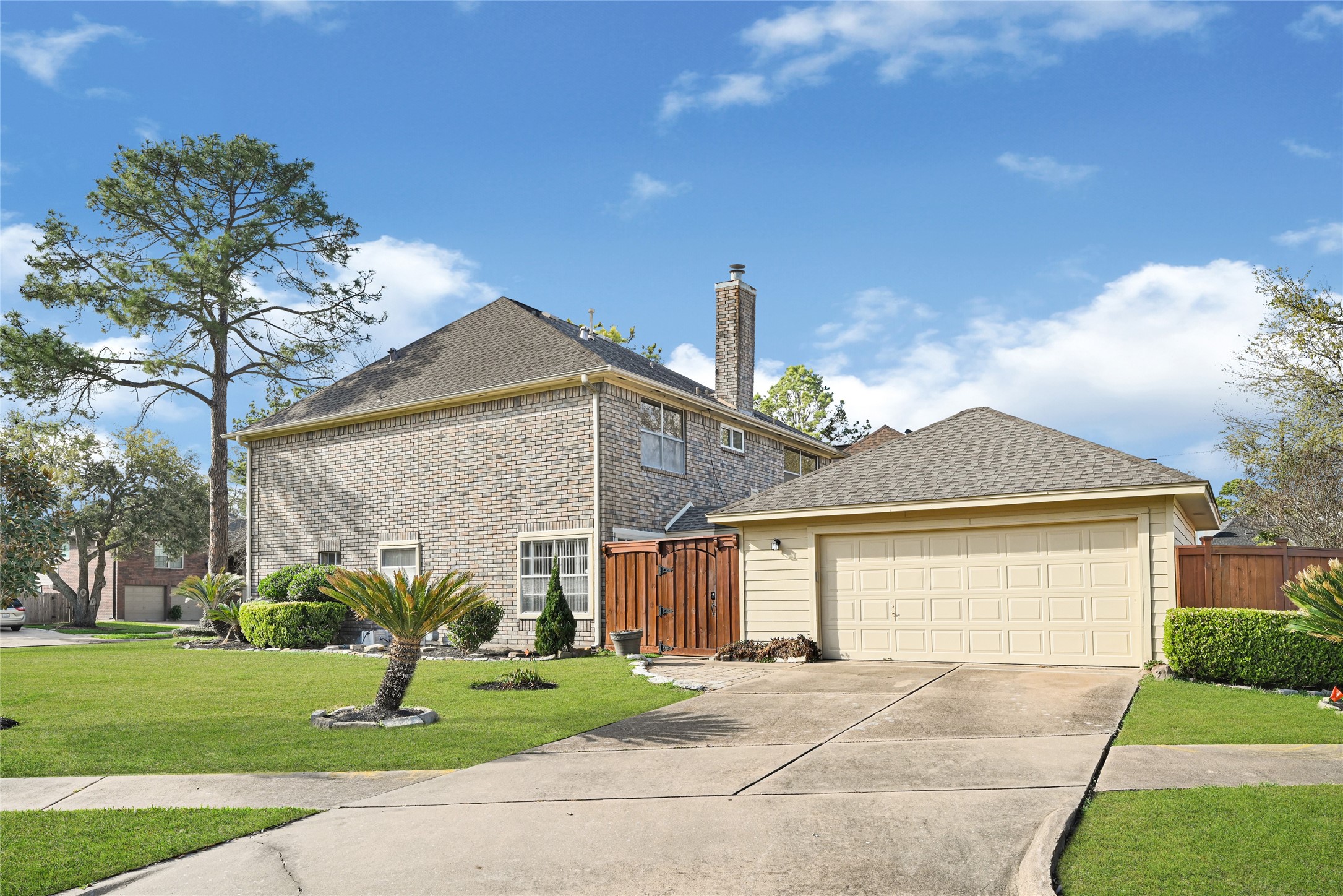 5910 Rolff Lane Houston, TX 77084 - Photo 6 of 50 Rear/side exterior with garage access and well-maintained condition throughout.