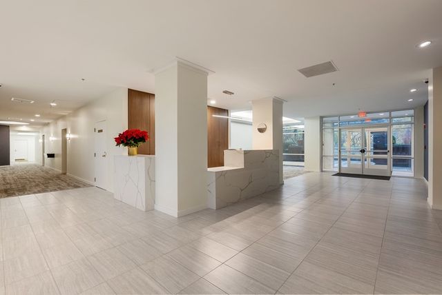 a view of a electric room and kitchen with a sink