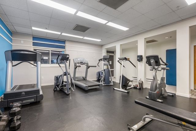 a view of a patio with a table and chairs