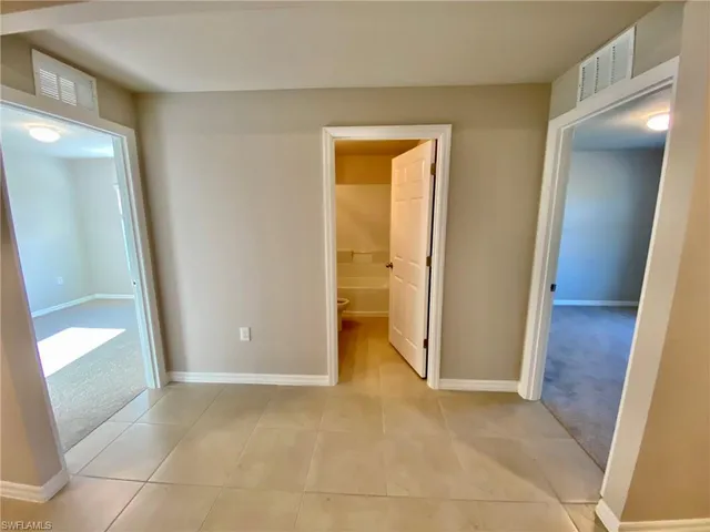 a view of entryway with a front door